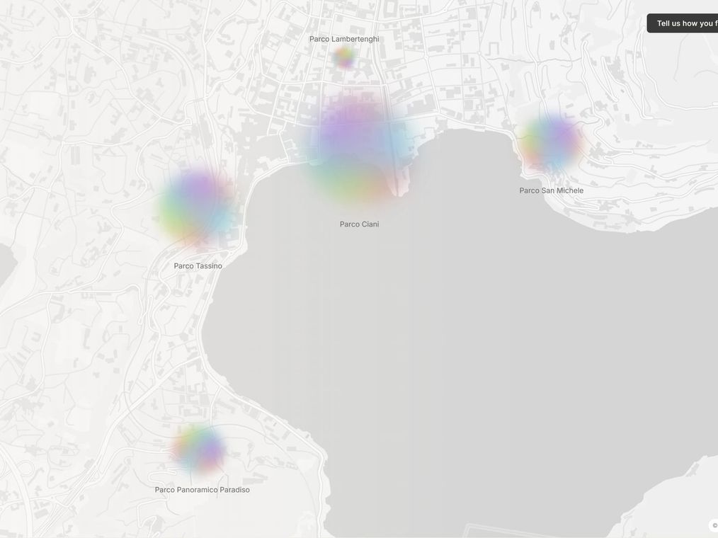 Lugano's five parks on a map, each a color-blended aura sized by its volume of reviews.