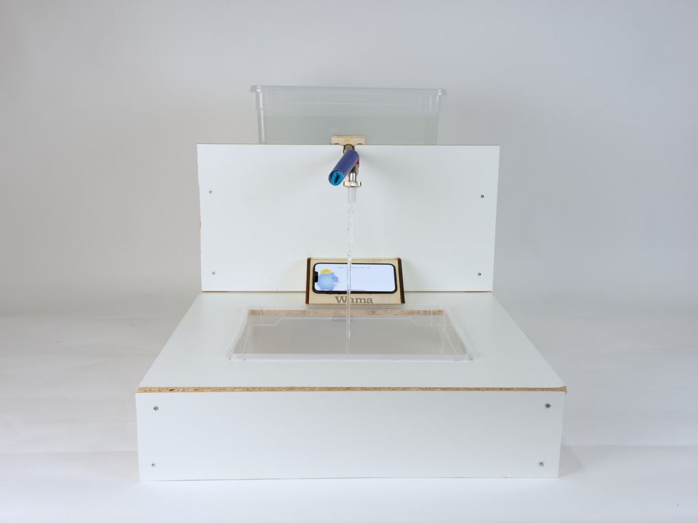 The sink rig with the tap running into the clear basin, the character settled on screen while the water flows.