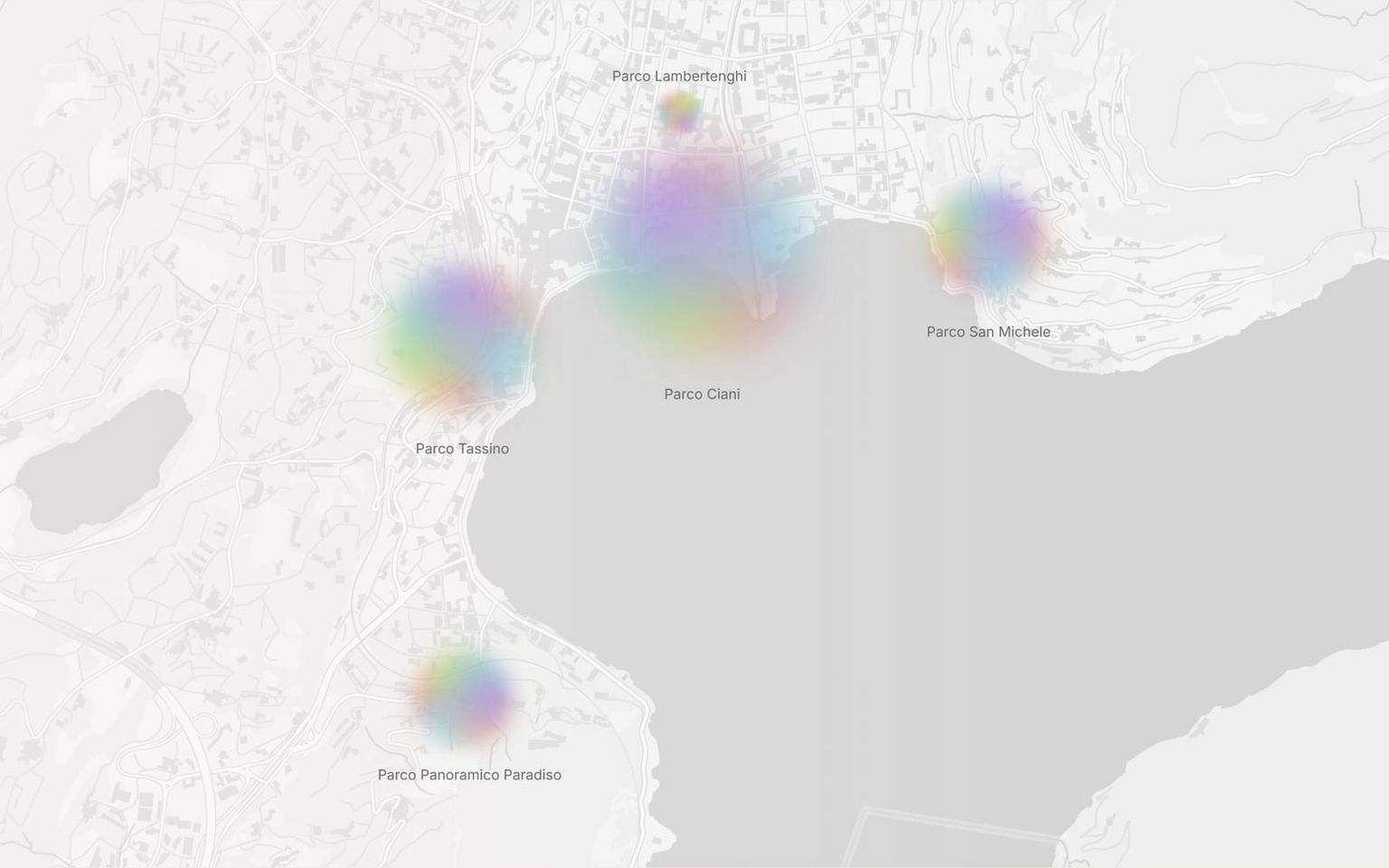 Lugano's five parks shown on a map, each as a color-blended organic aura sized by review volume.