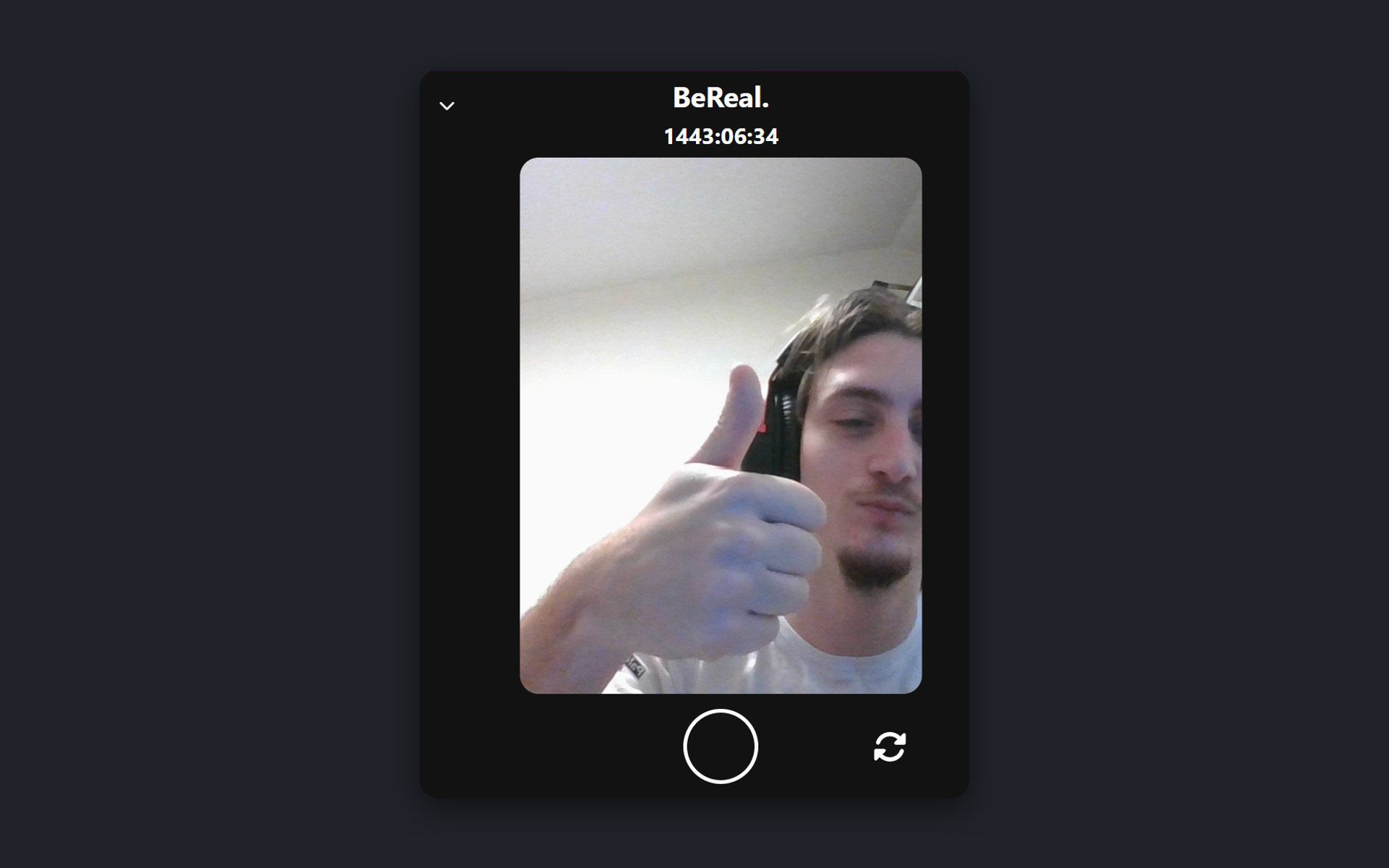 The capture screen mid-shot on a dark mobile interface: the front camera fills the frame with a live selfie, with a round shutter button and a flip-camera control below, under the BeReal header and a countdown.